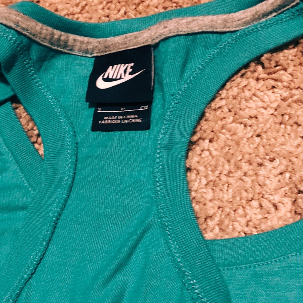 Nike shirt small, tealish green color